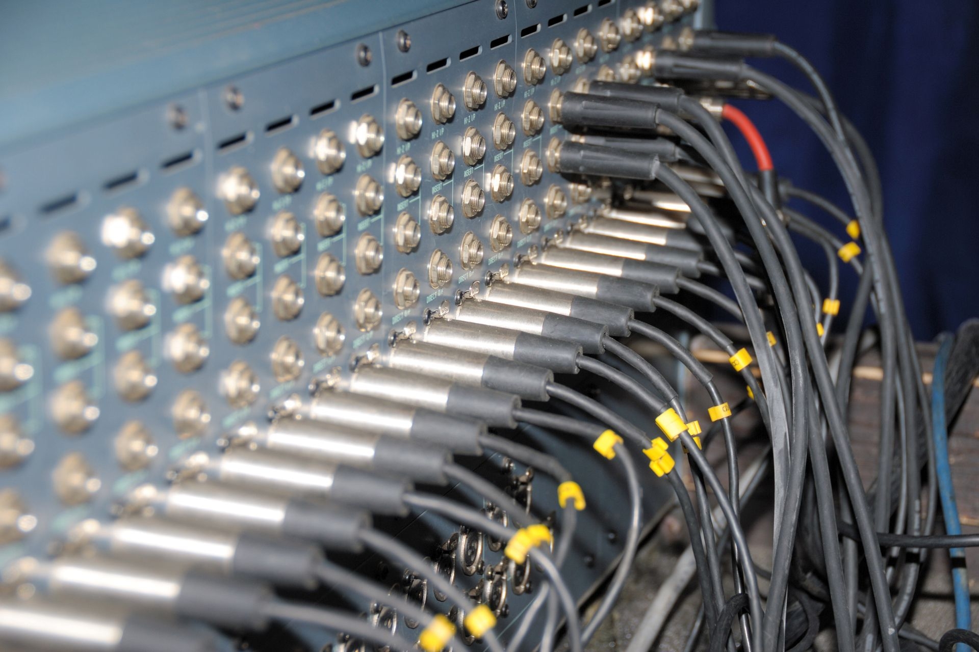 Are there specific power requirements for rack-mounted fiber optic converters?